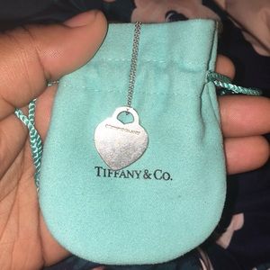 And original Tiffany chain with the bag